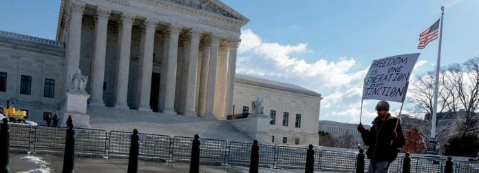 supreme-court-protester-getty1363291694 High Court protester