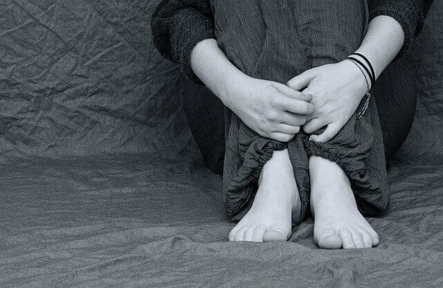 grief Image of person sitting in isolation